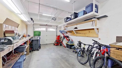 39 Sunrise View, Cochrane, AB - Indoor Photo Showing Garage