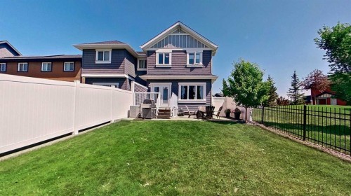 39 Sunrise View, Cochrane, AB - Outdoor With Deck Patio Veranda