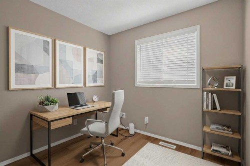 59 Silver Springs Way Nw, Airdrie, AB - Indoor Photo Showing Office