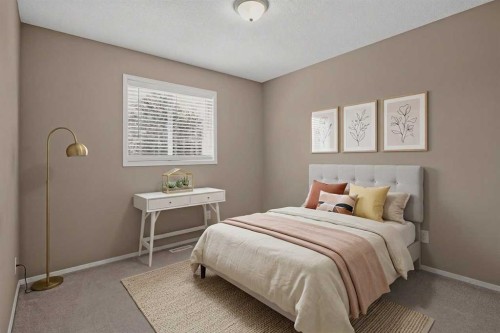 59 Silver Springs Way Nw, Airdrie, AB - Indoor Photo Showing Bedroom