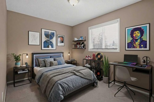 59 Silver Springs Way Nw, Airdrie, AB - Indoor Photo Showing Bedroom