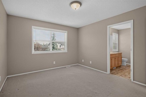 59 Silver Springs Way Nw, Airdrie, AB - Indoor Photo Showing Other Room