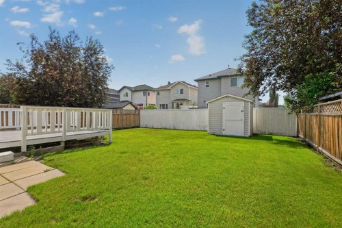 59 Silver Springs Way Nw, Airdrie, AB - Outdoor With Backyard