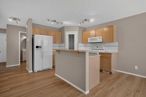 59 Silver Springs Way Nw, Airdrie, AB - Indoor Photo Showing Kitchen