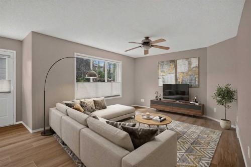 59 Silver Springs Way Nw, Airdrie, AB - Indoor Photo Showing Living Room