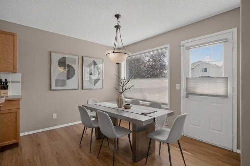 59 Silver Springs Way Nw, Airdrie, AB - Indoor Photo Showing Dining Room