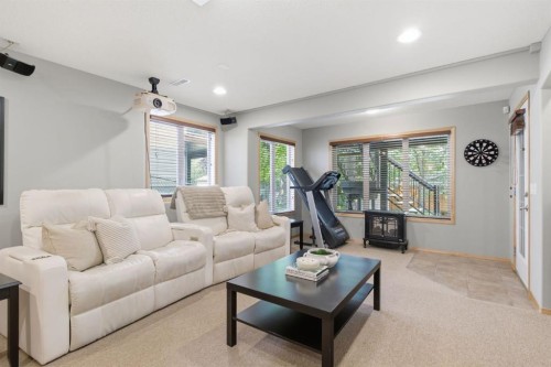 132 Coopers Heights Sw, Airdrie, AB - Indoor Photo Showing Living Room