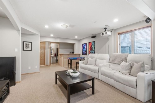 132 Coopers Heights Sw, Airdrie, AB - Indoor Photo Showing Living Room