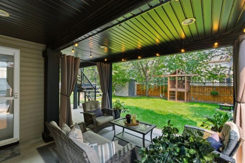 132 Coopers Heights Sw, Airdrie, AB - Outdoor With Deck Patio Veranda With Exterior