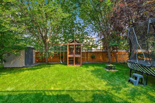 132 Coopers Heights Sw, Airdrie, AB - Outdoor With Backyard