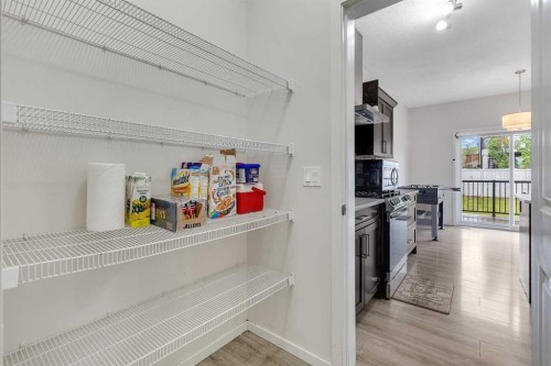 262 Hillcrest Heights Sw, Airdrie, AB - Indoor With Storage