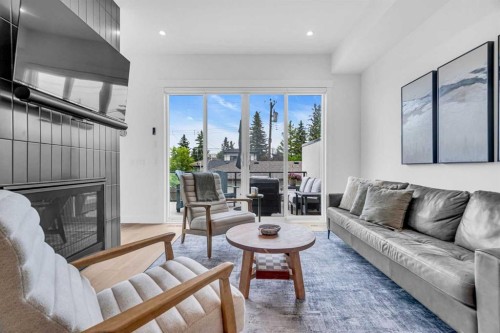 2032 37 Avenue Sw, Calgary, AB - Indoor Photo Showing Living Room With Fireplace
