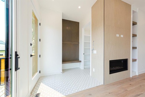 2028 36 Street Sw, Calgary, AB - Indoor Photo Showing Other Room With Fireplace