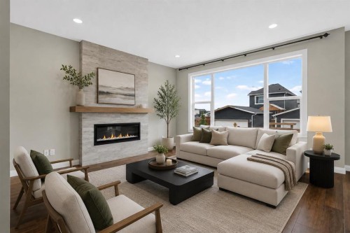 62 Evansfield Green Nw, Calgary, AB - Indoor Photo Showing Living Room With Fireplace