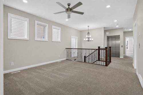 62 Evansfield Green Nw, Calgary, AB - Indoor Photo Showing Other Room