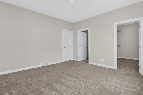 62 Evansfield Green Nw, Calgary, AB - Indoor Photo Showing Other Room