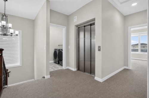 62 Evansfield Green Nw, Calgary, AB - Indoor Photo Showing Other Room