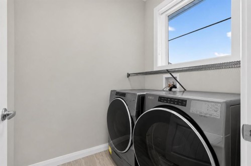 62 Evansfield Green Nw, Calgary, AB - Indoor Photo Showing Laundry Room