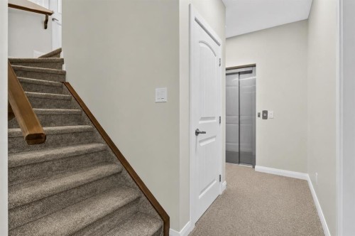 62 Evansfield Green Nw, Calgary, AB - Indoor Photo Showing Other Room