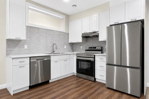 62 Evansfield Green Nw, Calgary, AB - Indoor Photo Showing Kitchen With Stainless Steel Kitchen With Upgraded Kitchen