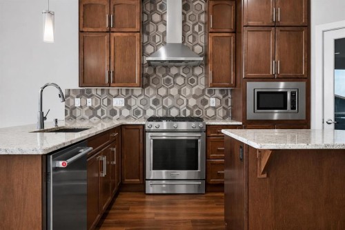 62 Evansfield Green Nw, Calgary, AB - Indoor Photo Showing Kitchen With Upgraded Kitchen