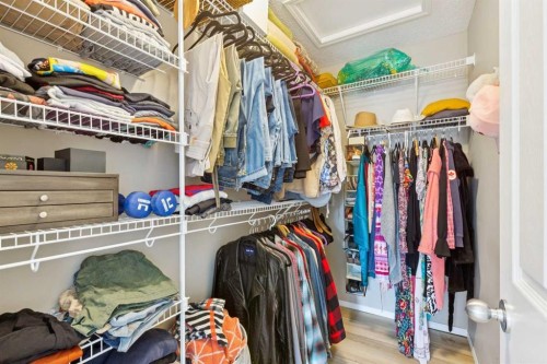 147 Sunset Cove, Cochrane, AB - Indoor With Storage