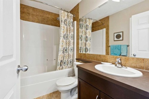 147 Sunset Cove, Cochrane, AB - Indoor Photo Showing Bathroom