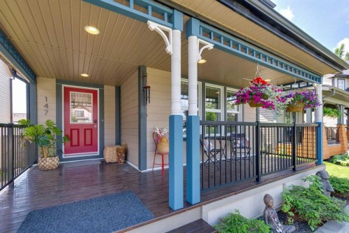 147 Sunset Cove, Cochrane, AB - Outdoor With Deck Patio Veranda