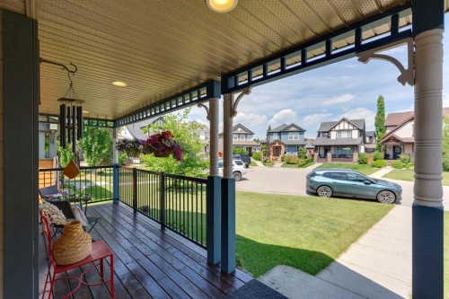 147 Sunset Cove, Cochrane, AB - Outdoor With Deck Patio Veranda