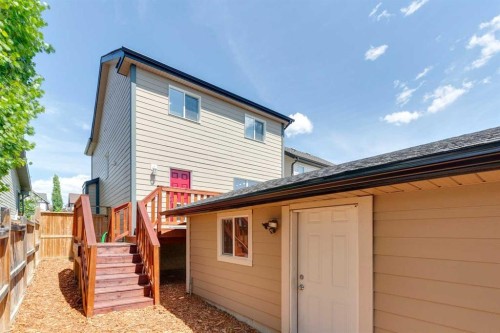 147 Sunset Cove, Cochrane, AB - Outdoor With Exterior