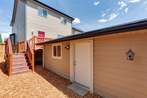 147 Sunset Cove, Cochrane, AB - Outdoor With Exterior