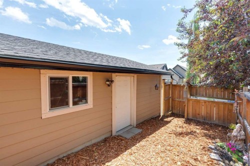 147 Sunset Cove, Cochrane, AB - Outdoor With Exterior