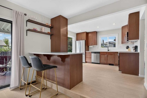 51 Millbank Court Sw, Calgary, AB - Indoor Photo Showing Kitchen