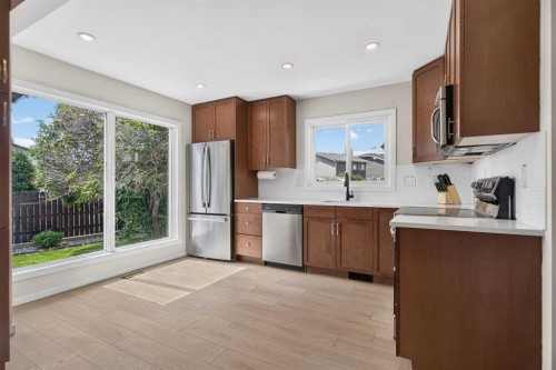 51 Millbank Court Sw, Calgary, AB - Indoor Photo Showing Kitchen