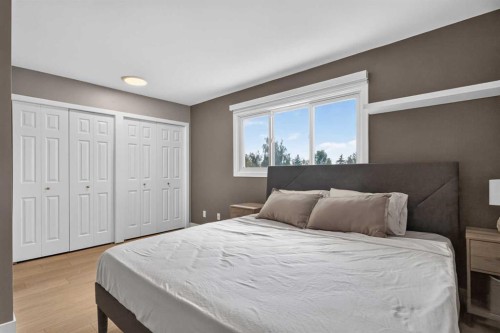 51 Millbank Court Sw, Calgary, AB - Indoor Photo Showing Bedroom