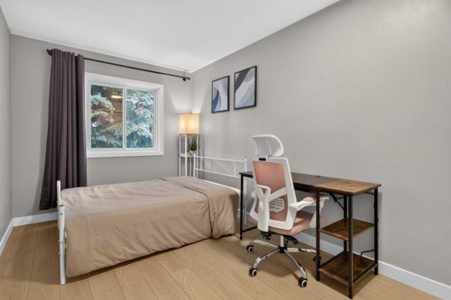 51 Millbank Court Sw, Calgary, AB - Indoor Photo Showing Bedroom