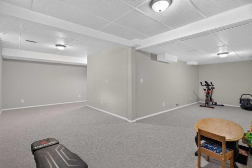 51 Millbank Court Sw, Calgary, AB - Indoor Photo Showing Other Room
