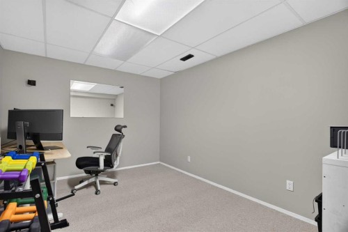 51 Millbank Court Sw, Calgary, AB - Indoor Photo Showing Other Room