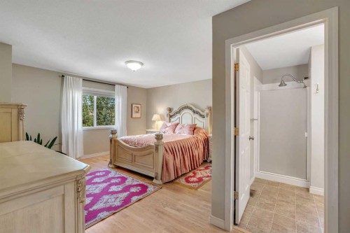 84 Willowbrook Crescent Nw, Airdrie, AB - Indoor Photo Showing Bedroom