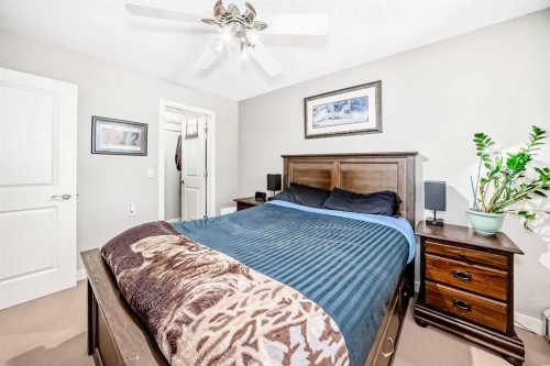 113-201 Sunset Drive, Cochrane, AB - Indoor Photo Showing Bedroom