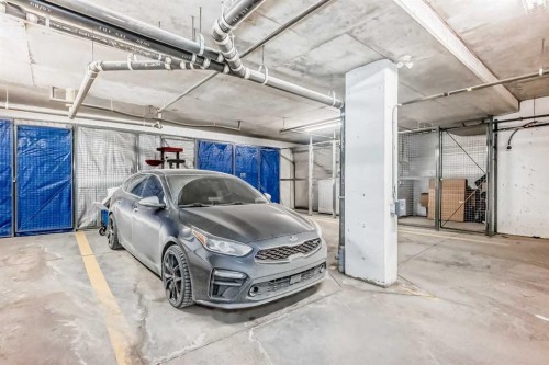 113-201 Sunset Drive, Cochrane, AB - Indoor Photo Showing Garage