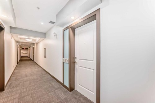 113-201 Sunset Drive, Cochrane, AB - Indoor Photo Showing Other Room