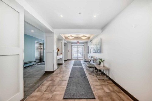 113-201 Sunset Drive, Cochrane, AB - Indoor Photo Showing Other Room