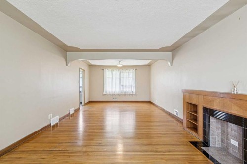 3103 13 Avenue Sw, Calgary, AB - Indoor Photo Showing Other Room With Fireplace