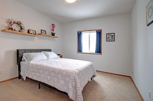 49 Thornfield Close Se, Airdrie, AB - Indoor Photo Showing Bedroom