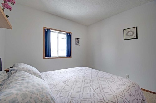 49 Thornfield Close Se, Airdrie, AB - Indoor Photo Showing Bedroom