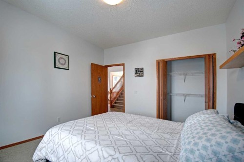 49 Thornfield Close Se, Airdrie, AB - Indoor Photo Showing Bedroom