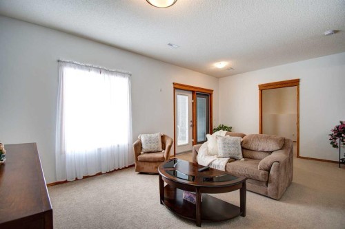 49 Thornfield Close Se, Airdrie, AB - Indoor Photo Showing Living Room