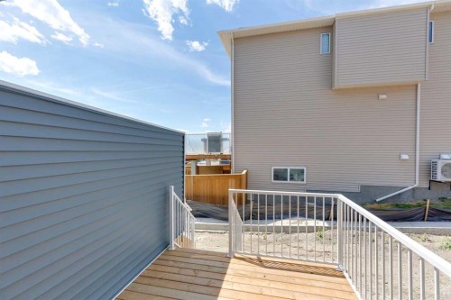 93 Heritage Park, Cochrane, AB - Outdoor With Deck Patio Veranda With Exterior