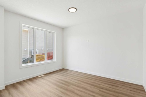 93 Heritage Park, Cochrane, AB - Indoor Photo Showing Other Room